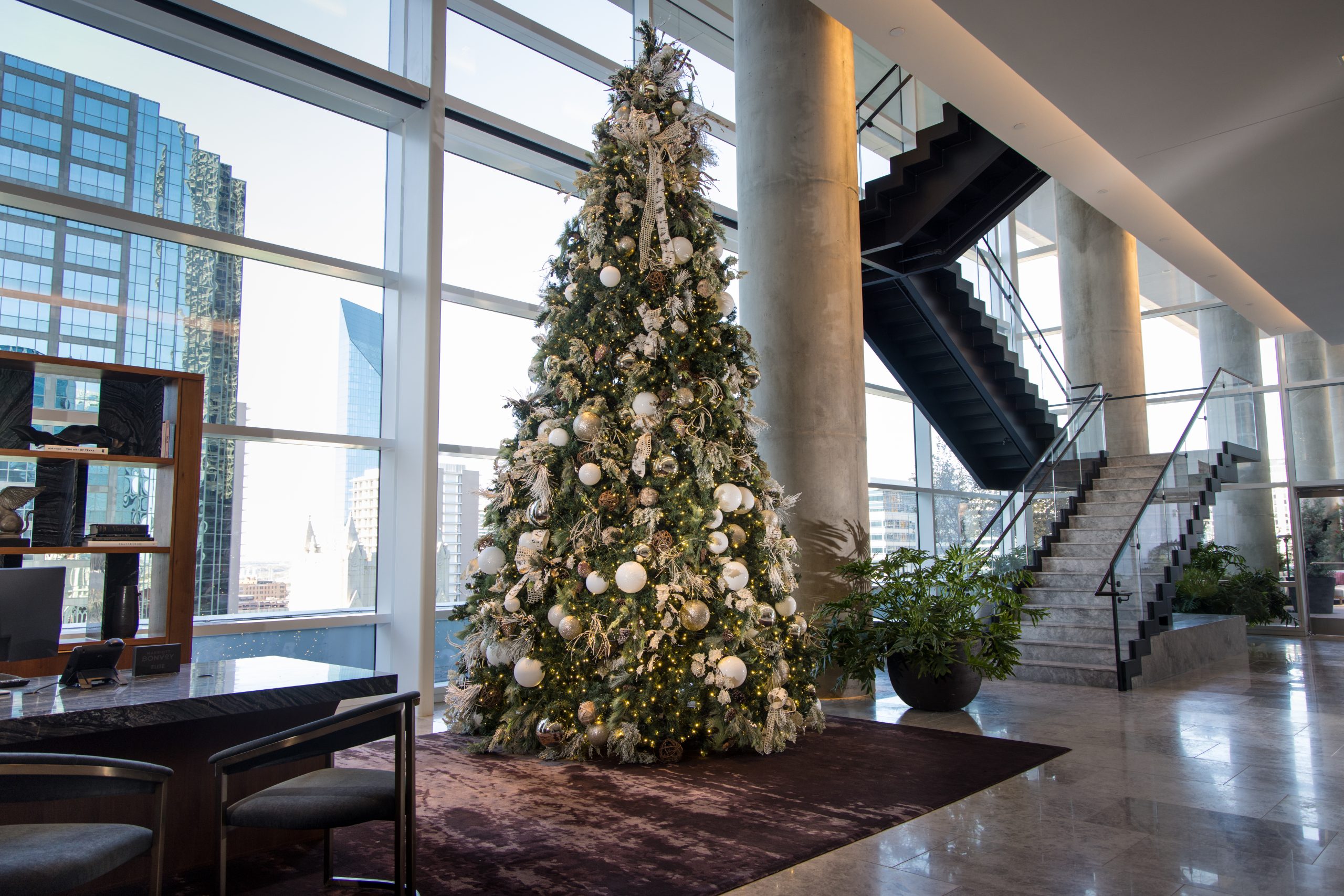 Holiday tree installation in a commercial lobby